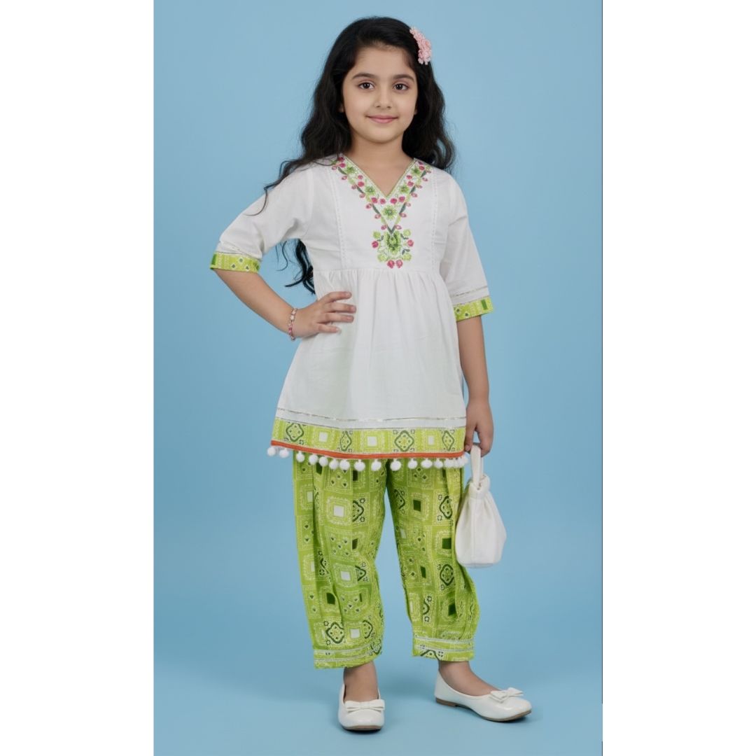 White peplum-style top with green Pathani Bottom Set - Image 2